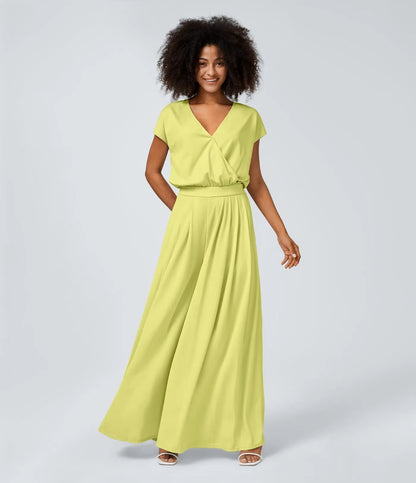 Jumpsuit™ - Tuta con scollatura a V, maniche corte, tasche laterali a pieghe e gamba larga, motivo a onde fluide.